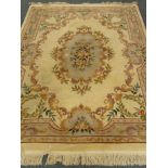Chinese beige ground woollen rug carpet, central medallion, repeating floral border,