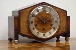 Art Deco walnut and oak mantel clock, angular case with silvered Arabic dial,