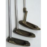 Two Slazenger Ping bronze Kushin putters & Anser putter with Karsten MFG Phoenix Ariz.