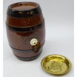 Late 19th century Doulton Lambeth 'Pedestrian Barrelette' barrel L22cm and Gladstone embossed brass