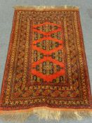 Afghan style red ground rug 102cm x 152cm Condition Report <a href='//www.