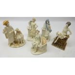 Five porcelain and stoneware Art Deco style women, three wearing lustre finish flapper dressed,