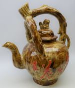 Massive Chinese brown glaze teapot with naturalistic branch work handle and Dog of Fo finial,
