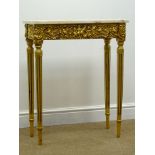 Gilt console table with rectangular marble top, decorated with cherubs and fruit swags,