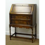 Early 20th century oak bureau, fall front, enclosing fitted interior, two drawers,