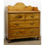 Early 20th century waxed pine washstand, raised shaped back and sides,