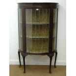 Early 20th century mahogany lead glazed bow front display cabinet, moulded top,