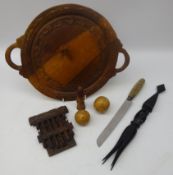 Two Oriental incised gourds, Continental treen needle case carved with grape vines,