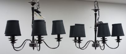 Pair of five branch centre lights with black shades,