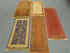 A quantity of rugs consisting of Bokhara and Persian style Condition Report <a