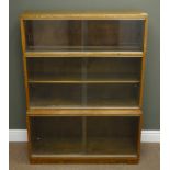 Mid 20th century oak stepped library style bookcase, two compartments with sliding glazed doors,