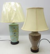 Oriental style ceramic table lamp of cylindrical tapered form decorated with birds amongst foliage,