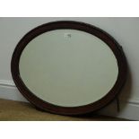 Oval mahogany framed bevel edge mirror, W80cm,