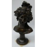 Patinated bronze bust of a maiden on waisted plinth,