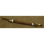 Medium wood and gilt circular curtain pole with round finials,