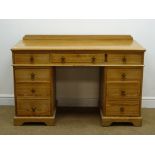 Victorian polished pitch pine twin pedestal desk, raised back, moulded top,