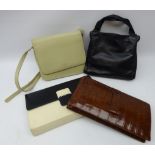 1950s Crocodile skin clutch bad with suede lining and gilt metal clasp,