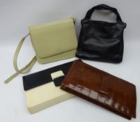 1950s Crocodile skin clutch bad with suede lining and gilt metal clasp,