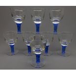 Set of eight claret glasses,