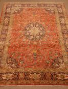 Kashan red ground rug, central medallion, repeating border,