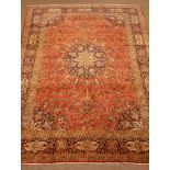 Kashan red ground rug, central medallion, repeating border,