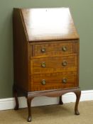 Early 20th century mahogany bureau, fall front enclosing fitted interior,