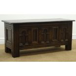 Old Charm oak chest, hinged moulded lid, three panel carved front, stile supports, W115cm, H52cm,