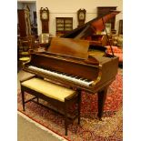 Early 20th century mahogany Rogers of London cast iron over strung baby grand piano, W153cm, H99cm,