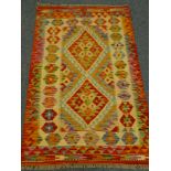 Choli Kelim vegetable dye wool rug, two medallions, repeating border,