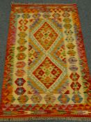 Choli Kelim vegetable dye wool rug, two medallions, repeating border,