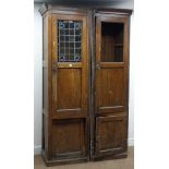 Edwardian oak cupboard, projecting cornice, lead glazed panelled doors, plinth base, W115cm, H213cm,