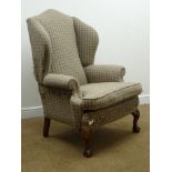 Georgian style upholstered wing back armchair,