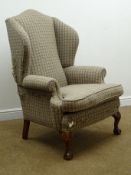 Georgian style upholstered wing back armchair,