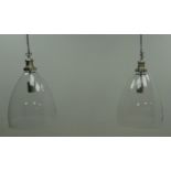 Pair Contemporary satin metal hanging light fittings with hand blown glass dome shades,