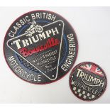 Two cast iron 'Triumph' car signs, D24cm max Condition Report <a href='//www.