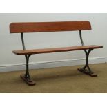 Cast iron framed garden bench, hardwood back seat and sledge feet,