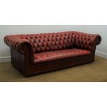 Vintage Chesterfield three seat sofa, upholstered in deeply buttoned oxblood red leather,