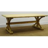 Light timber planked coffee table, shaped supports joined by single stretcher on sledge feet,