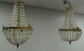 Pair gilt metal bag chandeliers with faceted glass drops,