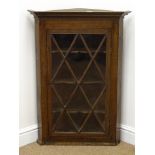 19th century oak hanging corner cupboard, projecting cornice,