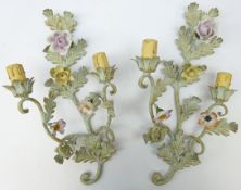 Pair of French patinated metal two branch electric wall sconces,