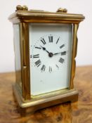 20th century brass Carriage timepiece, white Roman dial with blued steel hands, H15cm max,