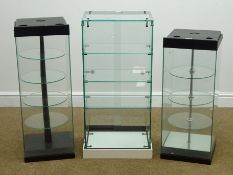 A rectangular display cabinet, four circular shelves (W31cm, H85cm,