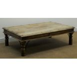 Rectangular eastern hardwood coffee table, moulded top, metal studs and strap work corners,