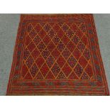 Gazak red and blue ground rug, geometric pattern field,