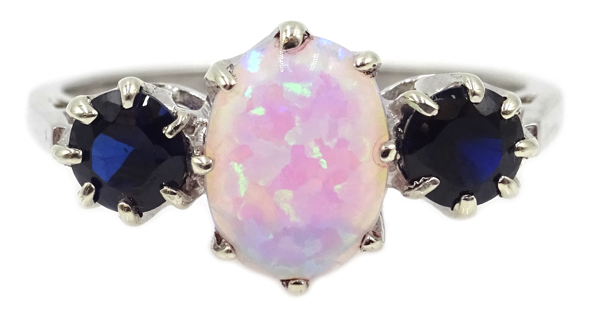 White gold opal and sapphire ring, hallmarked 9ct Condition Report Approx 2.