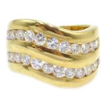 18ct gold diamond double channel ring, wave design stamped 750 Condition Report 13.