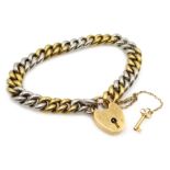 Platinum and 18ct gold (tested) curb chain bracelet with key and padlock, approx 33.