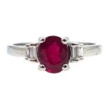 18ct white gold oval ruby and baguette diamond ring hallmarked,