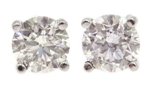 18ct white gold single stone diamond stud earrings, stamped 750,